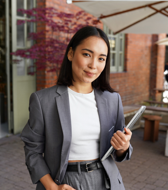 Businesswoman posing with tablet