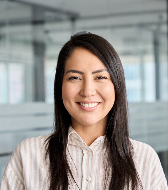 A portrait photo of a woman in a striped blouse smiling